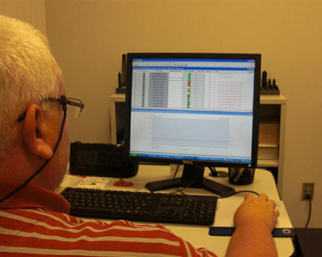man on computer